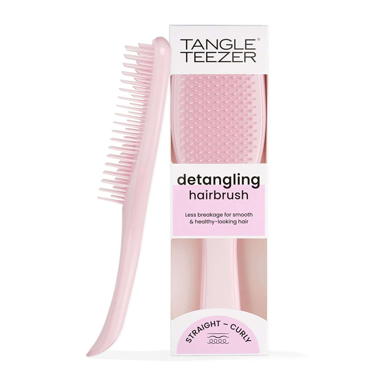 Pembe (Millennial Pink) renkli Tangle Teezer Ultimate Detangler saç fırçasının beyaz bir zemin üzerinde duran görseli.